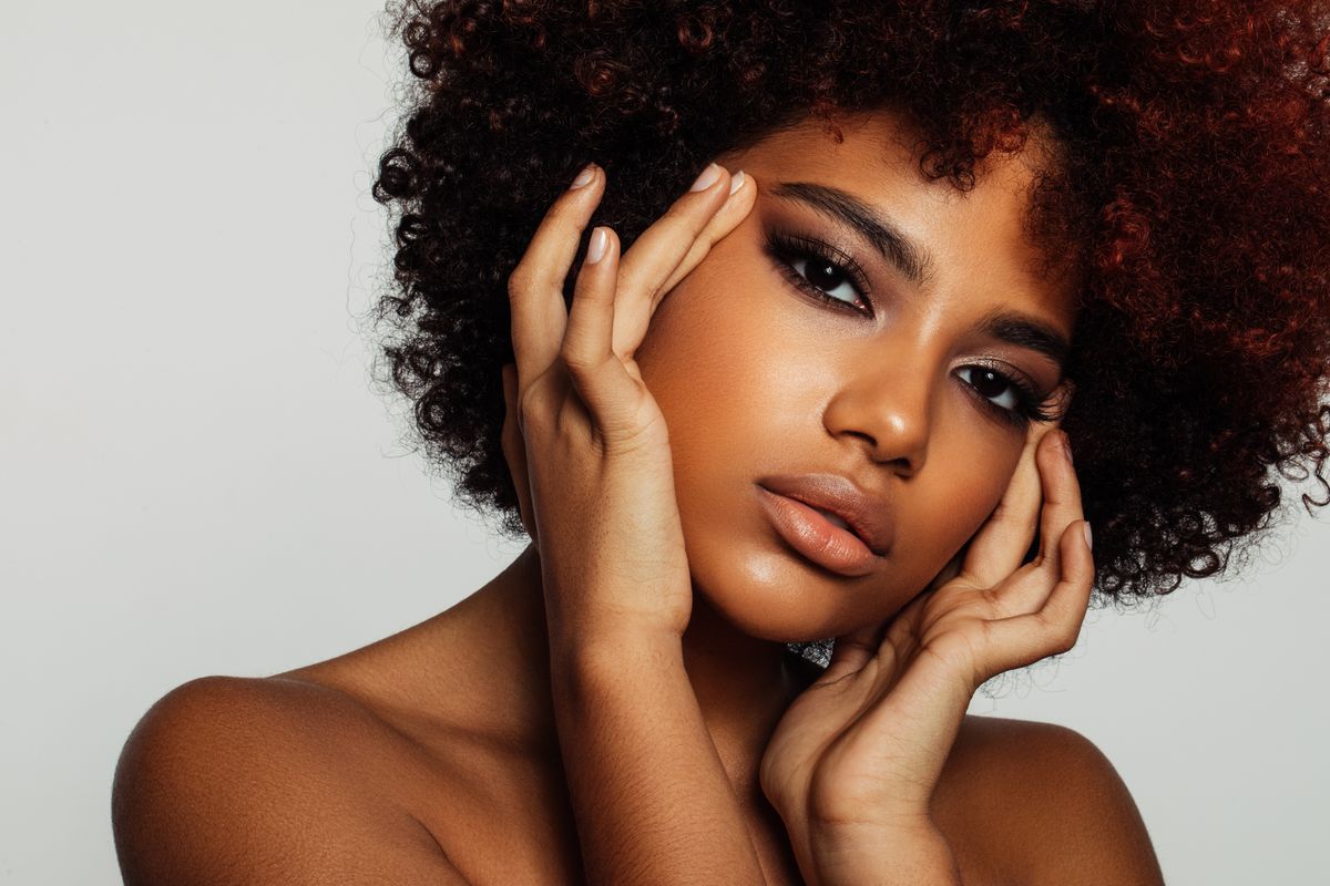 beautiful afro woman with perfect make up