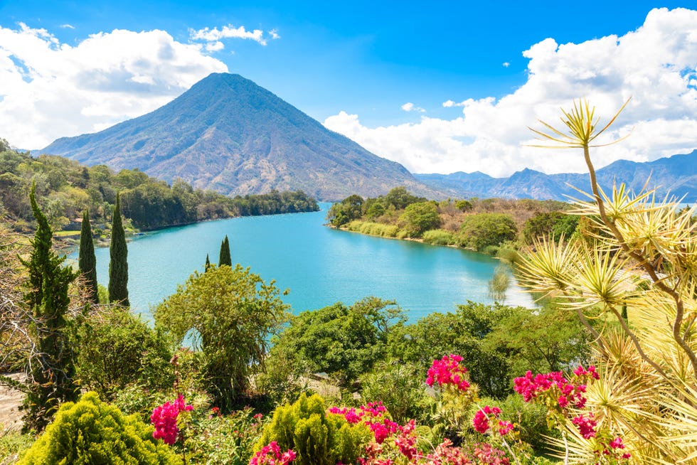 beautiful bay of lake atitlan with view to volcano san pedro in highlands of guatemala, central america