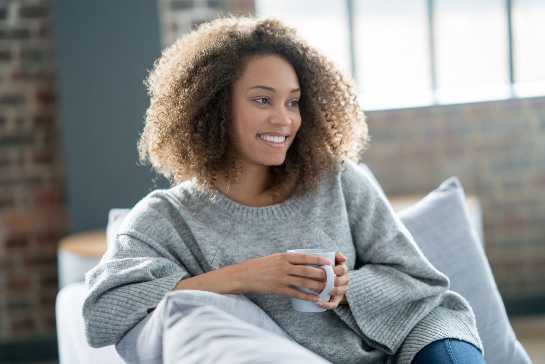 Premium Photo  Charming smiling afroamerican girl with messy hair