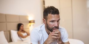 worried man in tension at bed