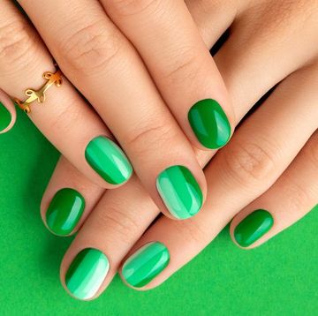 nails painted green for st patricks day on green background