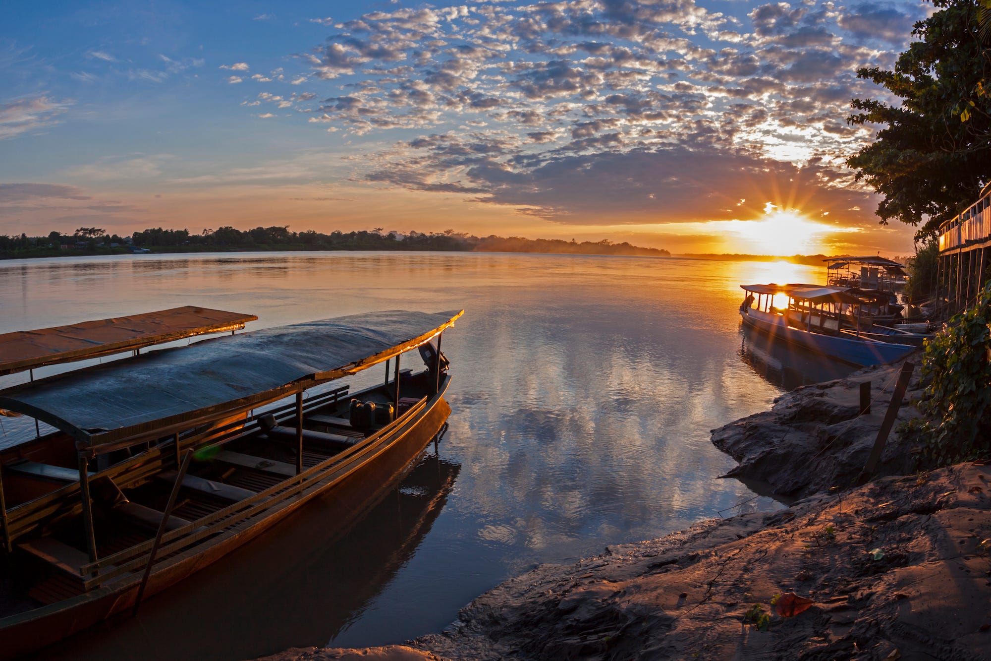 sunrises over water