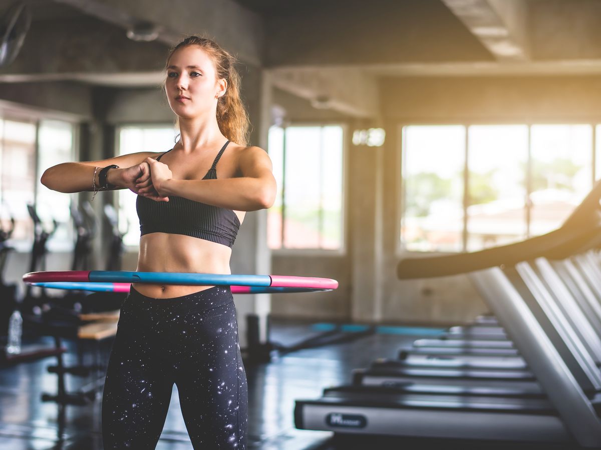 What is weighted hula hooping and why is it good for runners?