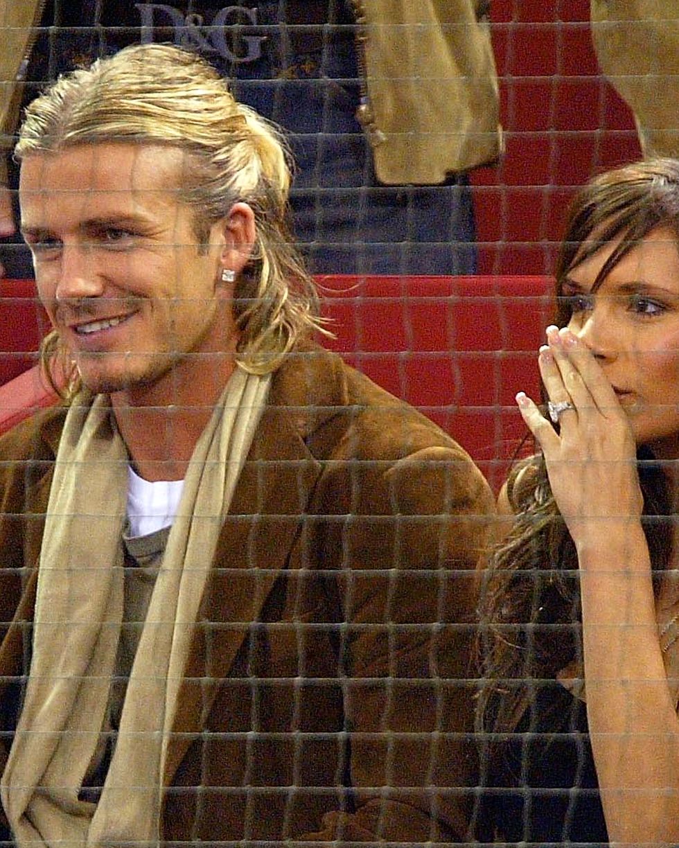 madrid, spain october 15 david beckham of real madrid and his wife victoria watch juan carlos ferrero of spain at the atp madrid masters at the nuevo rockodromo on october15, 2003 in madrid photo by mike hewittgetty images