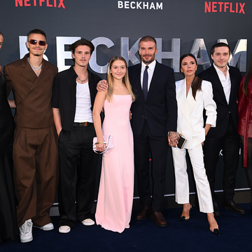 Beckhan family group of people at a promotional event for beckham on netflix