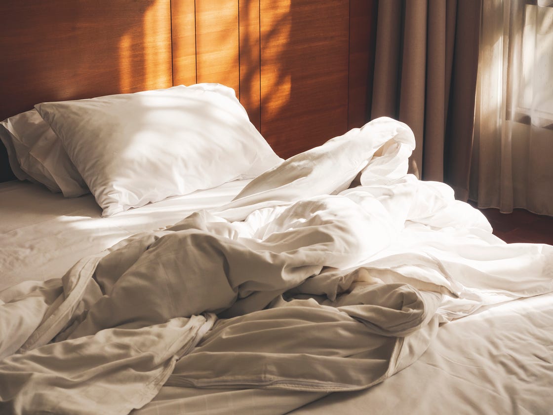 bed mattress pillows duvet unmade bedroom morning with sunlight bedroom interior