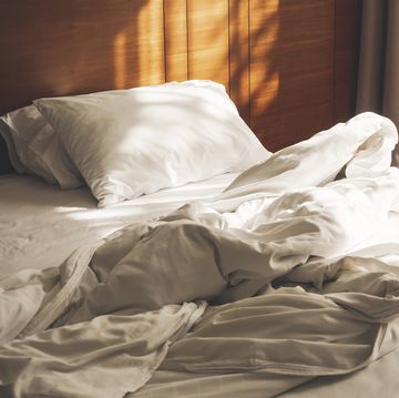 bed mattress pillows duvet unmade bedroom morning with sunlight bedroom interior