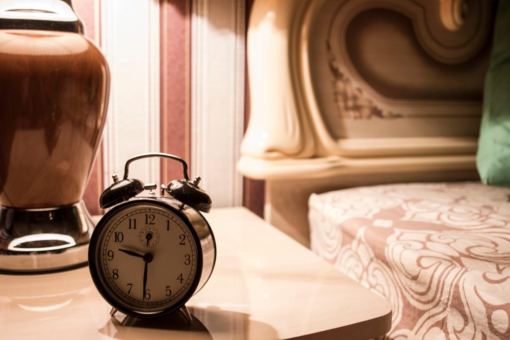 Alarm clock on bedside table