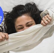 woman under sheets with bestproductscom bedding awards 2020 badge
