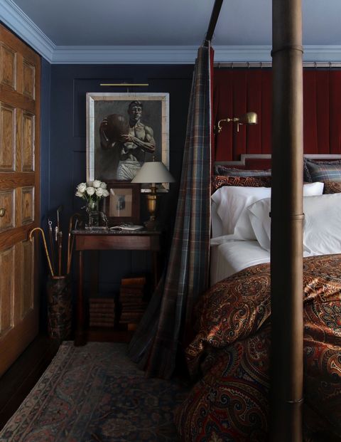 bedroom, blue painted walls, wooden side table, tartan bed curtains