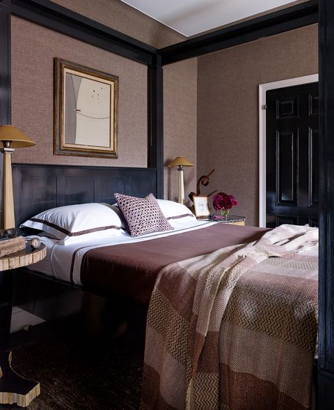 stylish bedroom with dark interiors