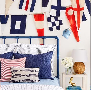 bedroom ideas, two bedrooms, one with a nautical design and the other decorated with bold patterns and shelves with trophies and toys