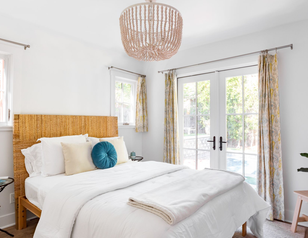 bedroom ideas, beaded light fixture above the bed