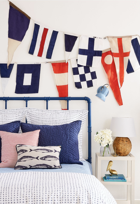 bedroom ideas nautical bedroom with flags hanging on the wall above the bed