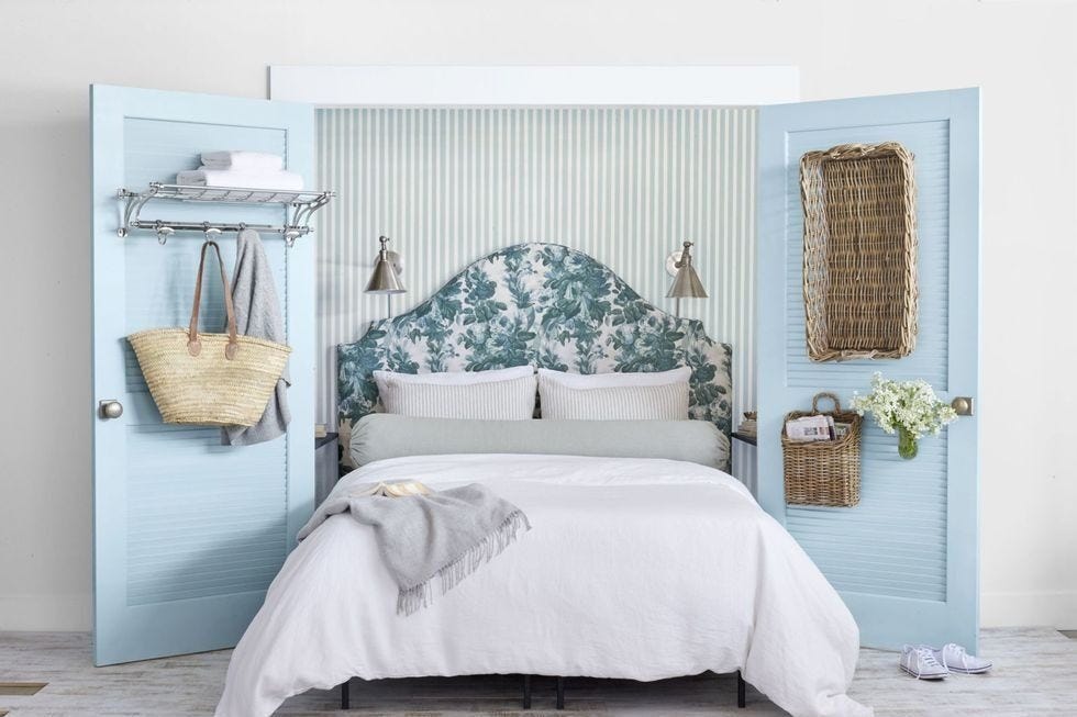 bedroom storage ideas, bed against the wall with two closet doors and baskets hanging