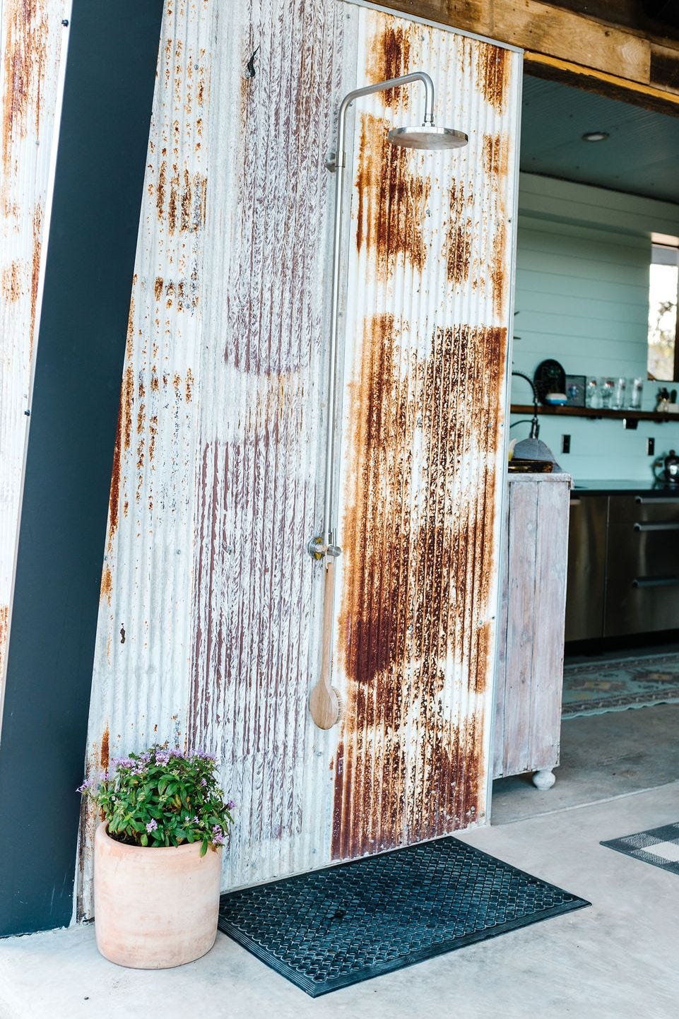 a galvanized panel used for an outdoor shower