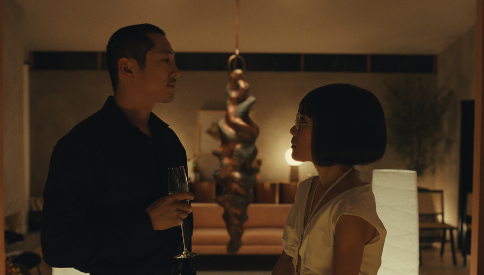 steven yeun as danny and ali wong as amy in beef season 1, episode 7