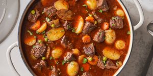 beef stew with potatoes, beef, carrots, and peas