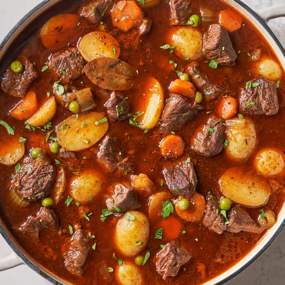 beef stew with potatoes, beef, carrots, and peas