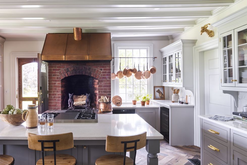 white farmhouse kitchen with brick hearth