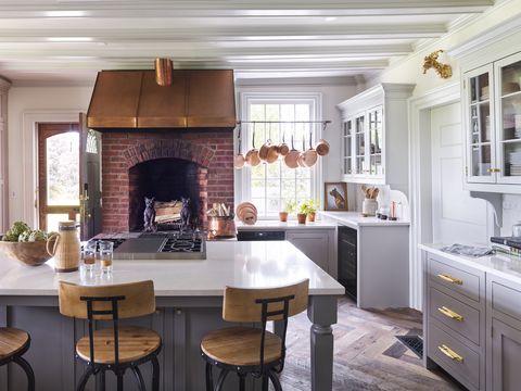 white farmhouse kitchen with brick hearth