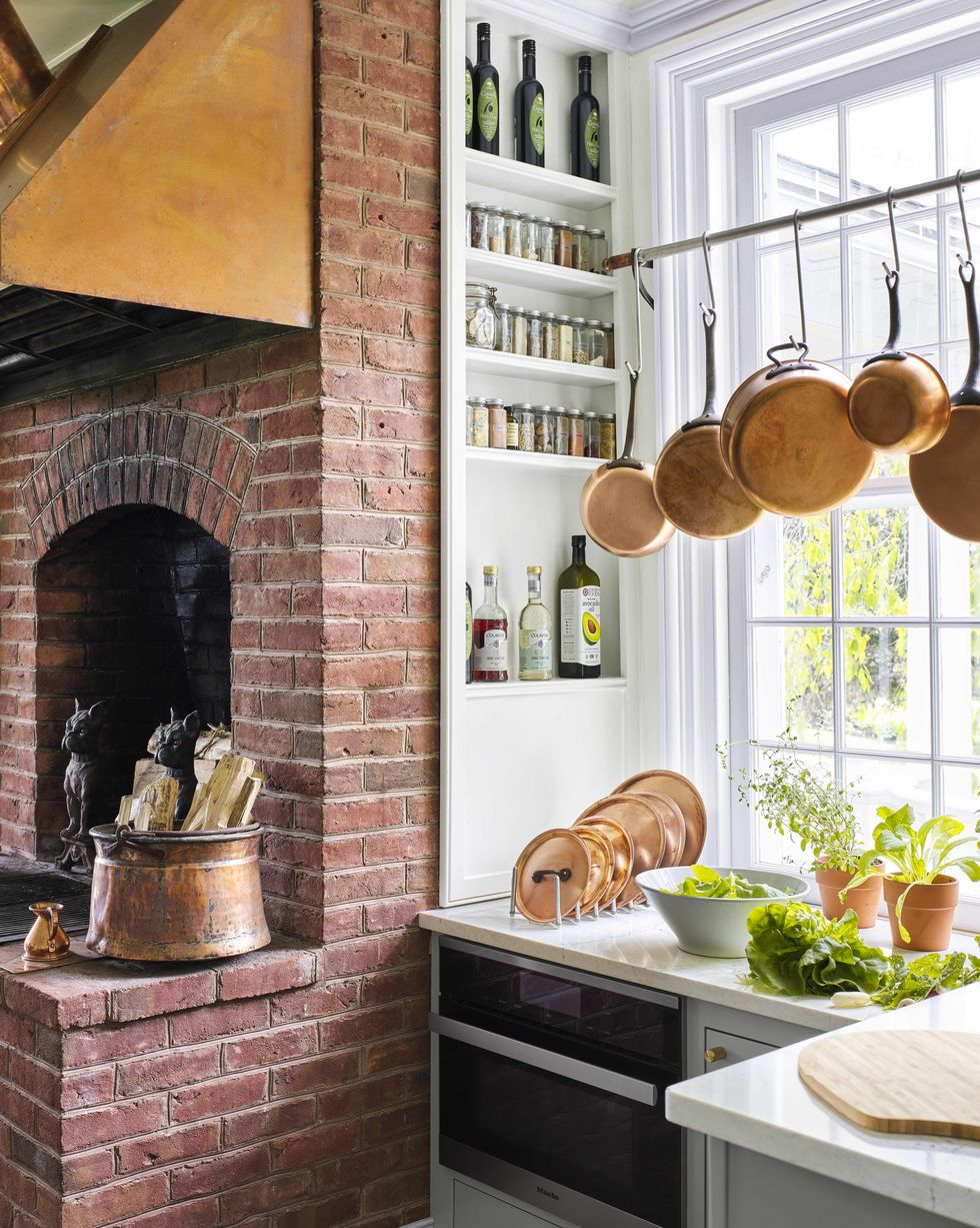 beekman boys' farmhouse kitchen with built in spice shelves