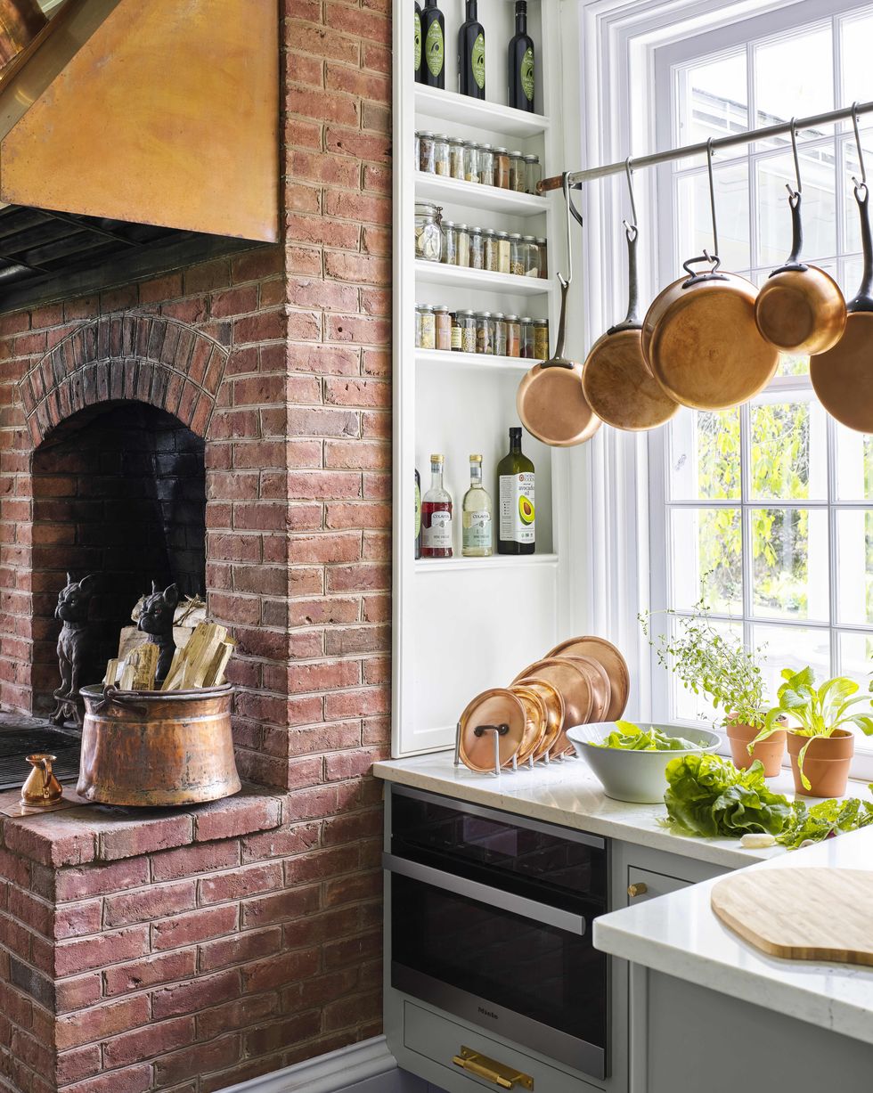 beekman boys' farmhouse kitchen with built in spice shelves