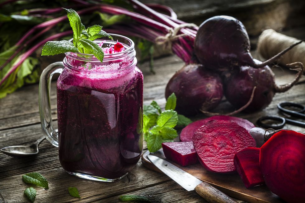 healthy drink beet juice on rustic wooden table