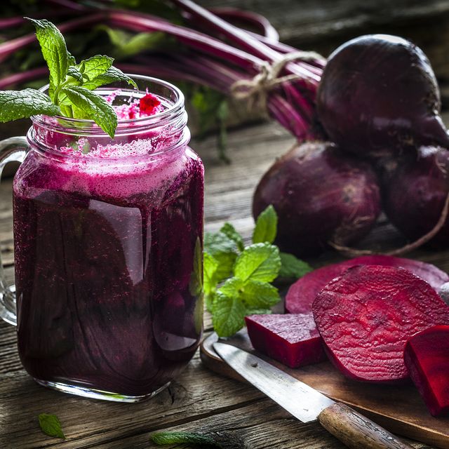 healthy drink: beet juice on rustic wooden table