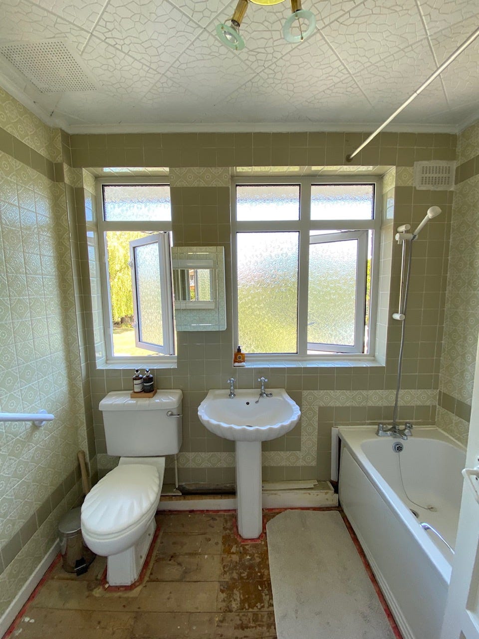 couple transform drab bathroom into stylish space