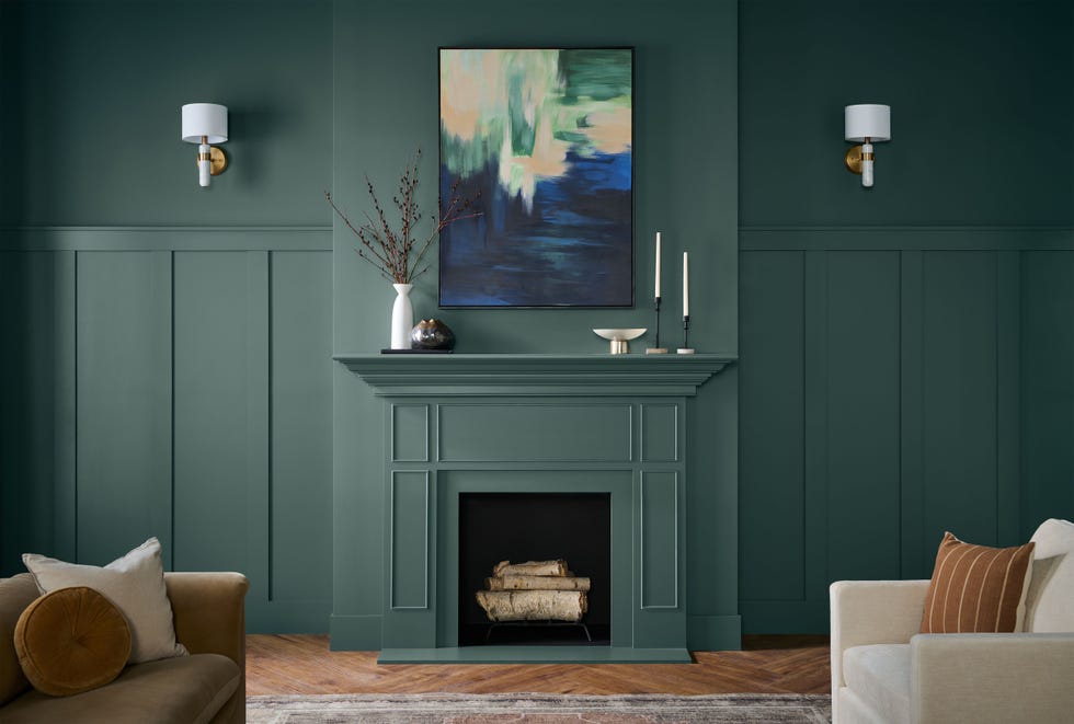 living room with fireplace and molding on the walls