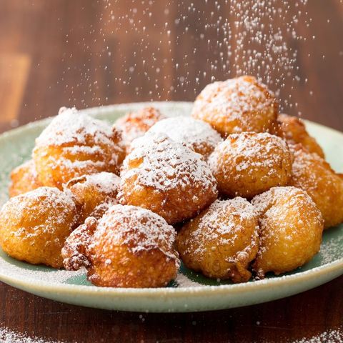 beignets dusted with powdered sugar