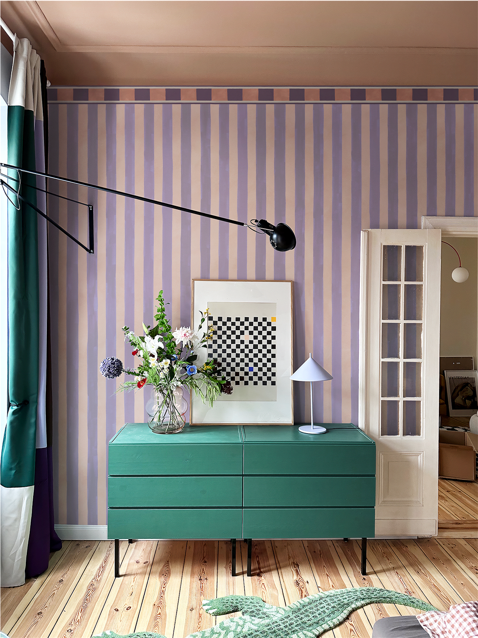 purple stripe wallpaper with green drawers