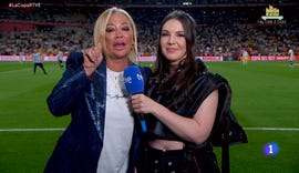 live interview at a football stadium during a match