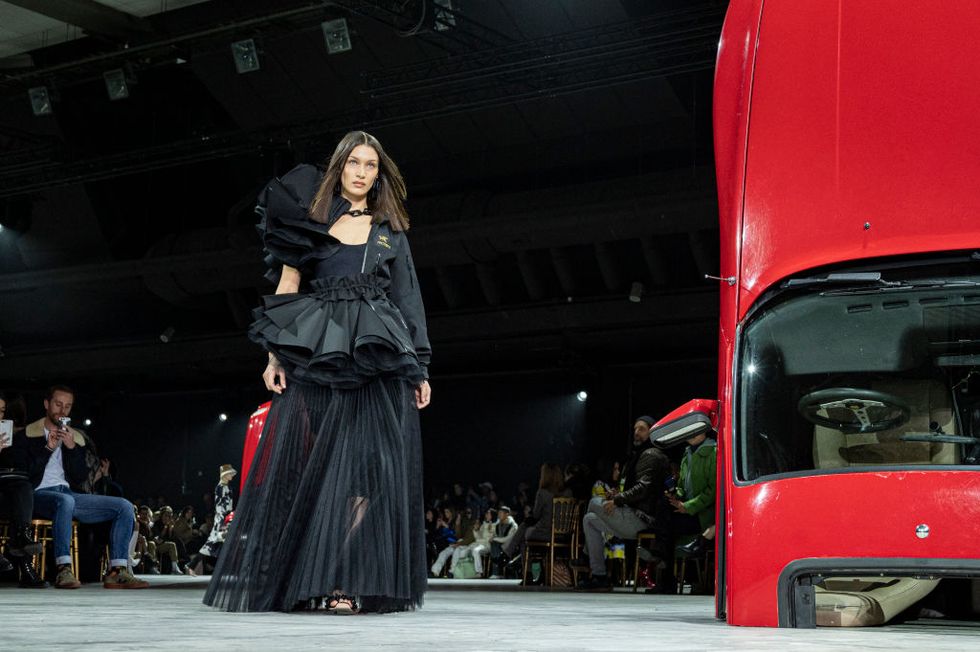 Yolanda Hadid walks Off-White show at Paris Fashion Week with Gigi and Bella  Hadid