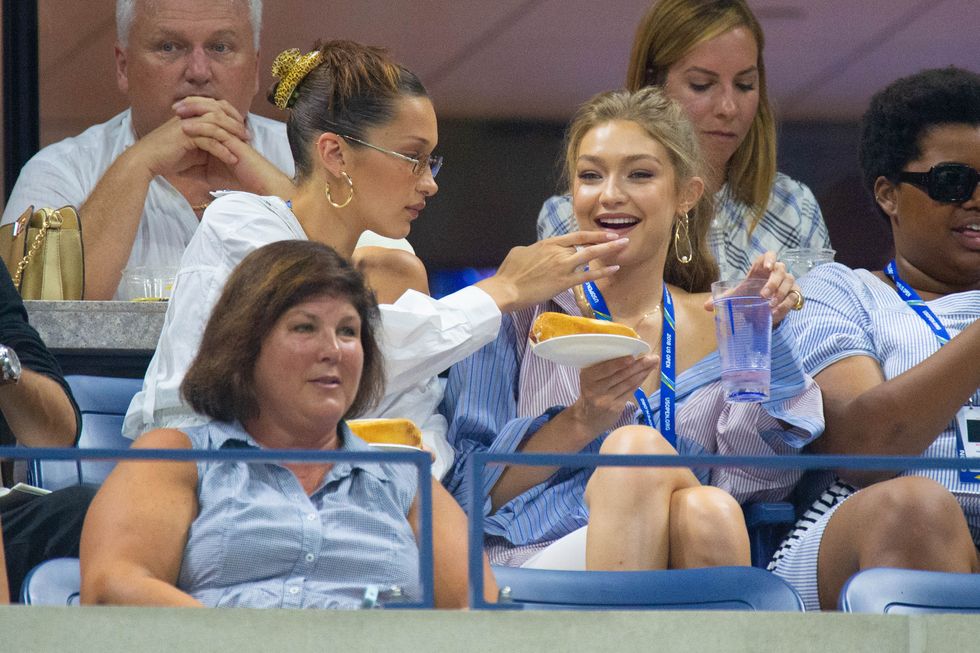 BELLA HADID and GIGI HADID Celebrities Attend The 2018 US Open Tennis Championships - Day 9