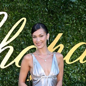 bella hadid wears a backless dress to the once upon a time chopard evening during the 77th annual cannes film festival