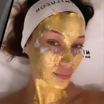 Bella Hadid preps for LFW with a 24k gold face treatment