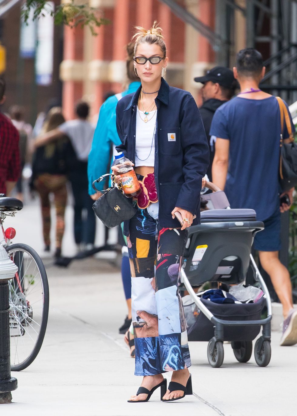 Gigi Hadid In Louis Vuitton Pants Out With Her Baby