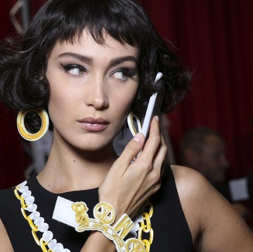 Moschino show, Backstage, Spring Summer 2017, Milan Fashion Week, Italy - 22 Sep 2016 bella hadid backstage photo by delphine achardwwdpenske media via getty images