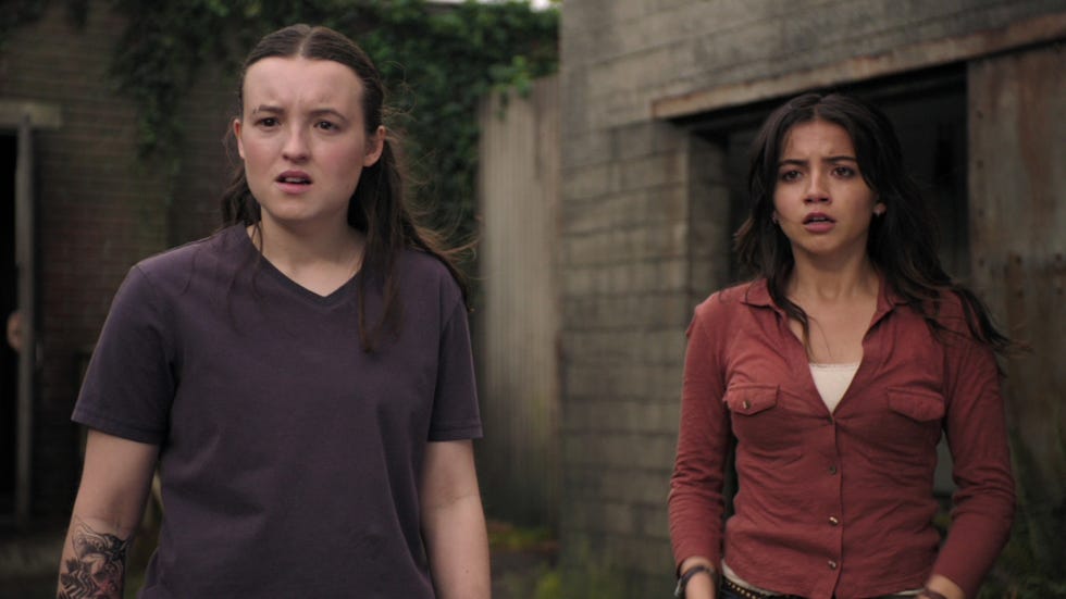 bella ramsey and isabela merced stand on a rooftop in a scene from the last of us season 2 episode 4