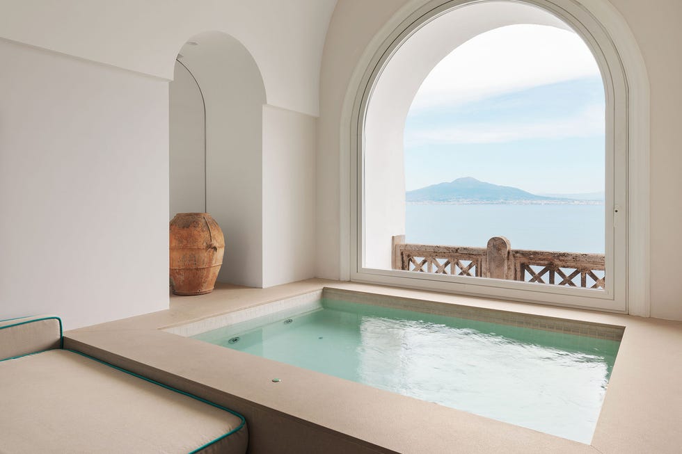 indoor spa with view of a coastal landscape