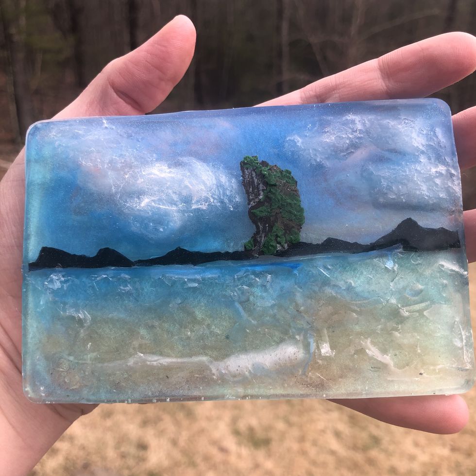 sculpted mountains, sky, and sand cast in resin