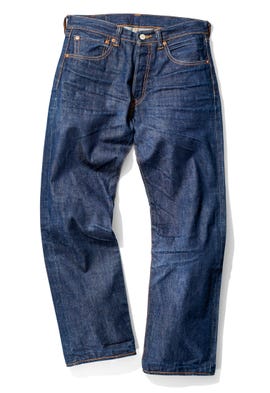 A pair of blue denim jeans laid flat