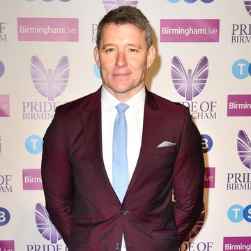 ben shephard arriving at the pride of birmingham awards 2022 wearing a deep purple suit and pale blue tie