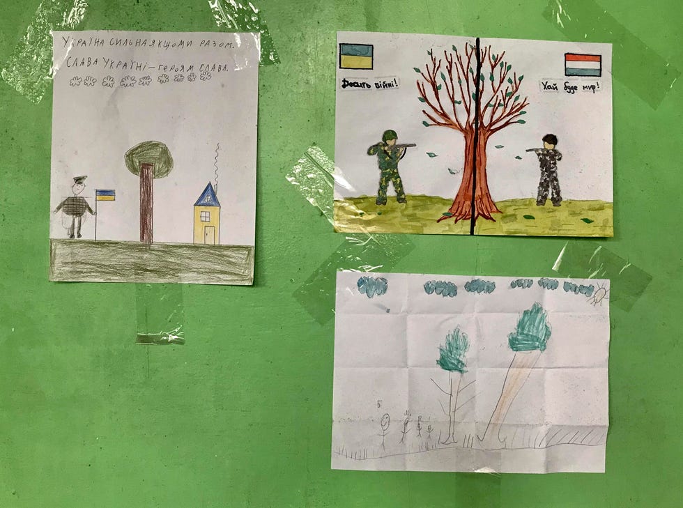 local and international volunteers support the resistance against the russian military in ukraine students’ drawings at a mykolaiv school