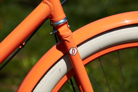 Bicycle part, Bicycle wheel, Bicycle, Bicycle tire, Bicycle frame, Orange, Bicycle handlebar, Vehicle, Bicycle fork, Road bicycle, 