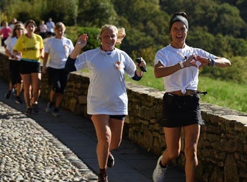 a man and woman running