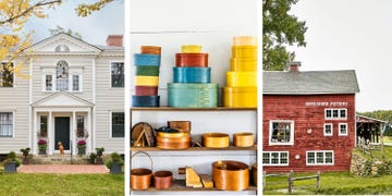 shaker oval boxes next to a red clapboard house