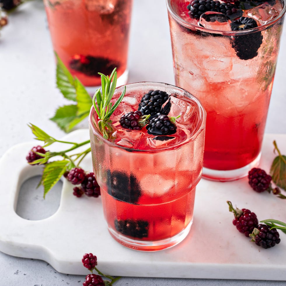 a group of glasses with liquid in them